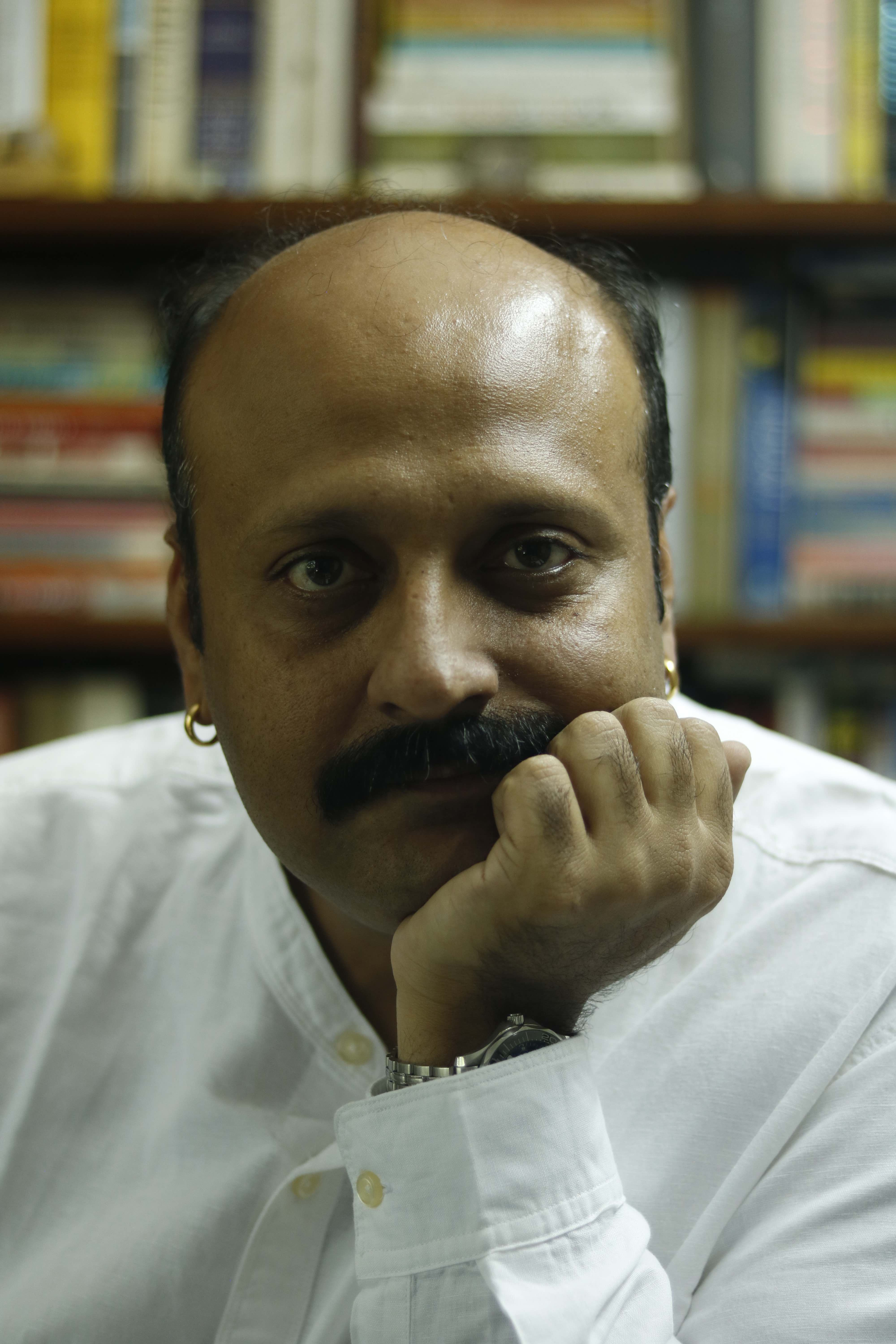 Portrait of Dr. Amit Kapoor, Honorary Chairman, Institute for Competitiveness of WELCOMEHEΛLTH